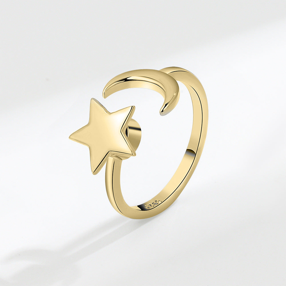 MOON AND STAR SPINNER RING